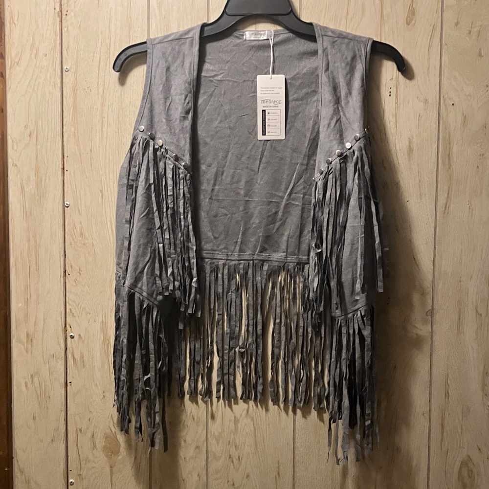 Gray fringe open-front vest with 16 silver studs on front.